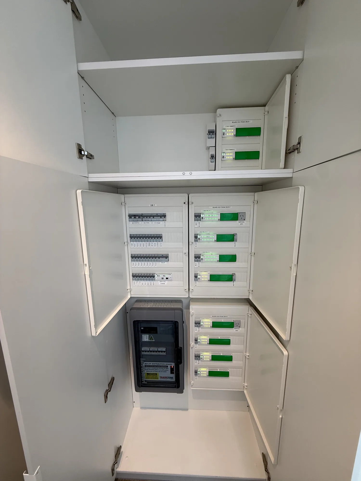 Smart home switchboard with C-Bus automation and solar by Wire & Watt, Brisbane