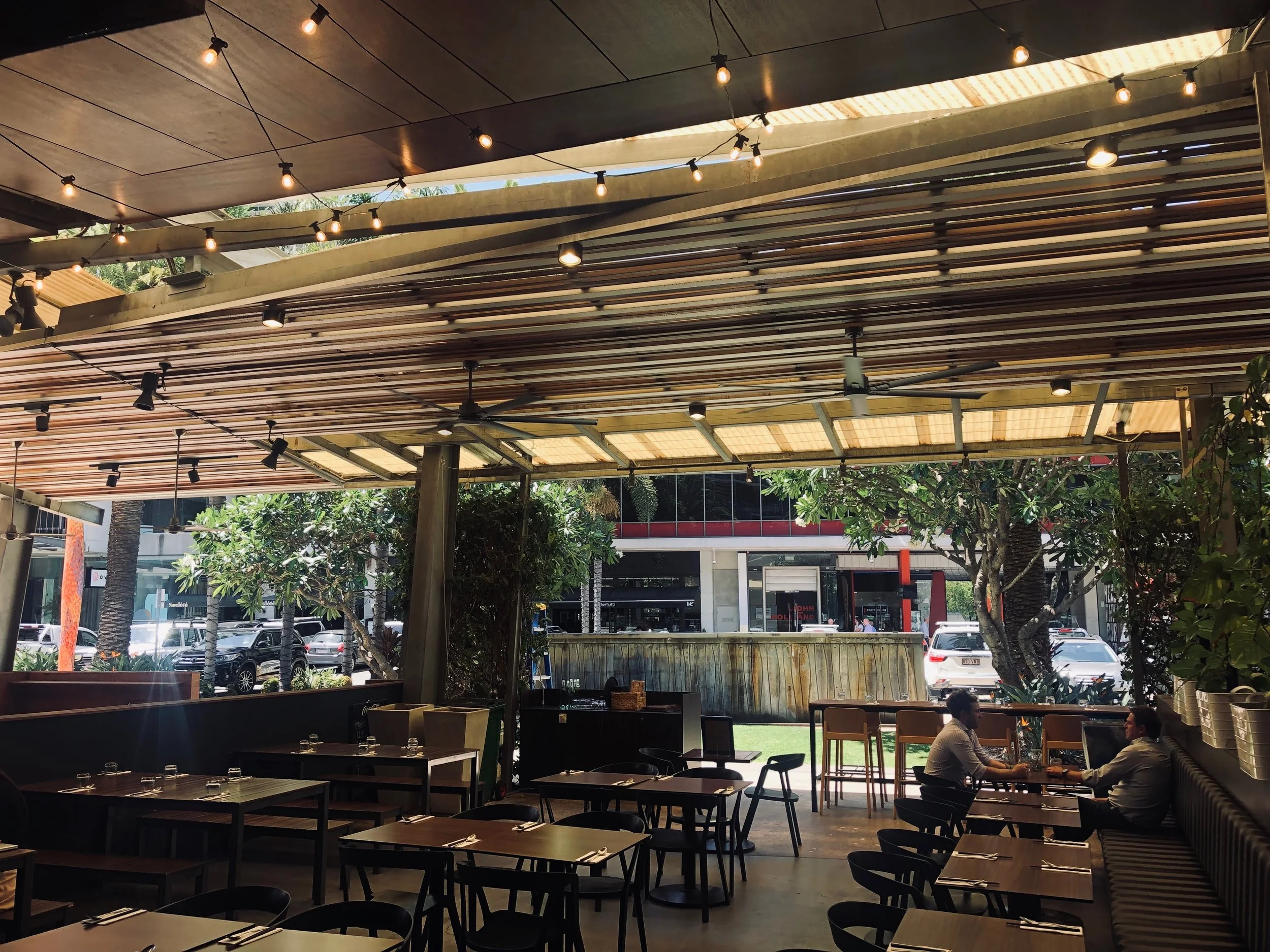 Festoon and track lighting at a Brisbane hospitality fit-out by Wire & Watt
